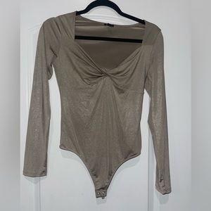 Express body contour body suit in shimmery gold size S